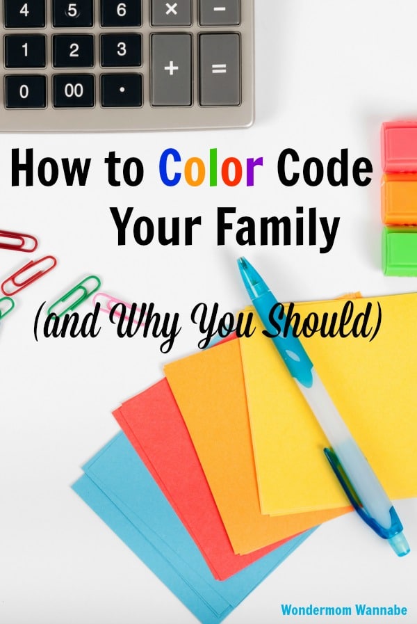 a calculator, colored paper clips and sticky notes, and a blue pen on a white background with title text reading How to Color Code Your Family and Why You Should