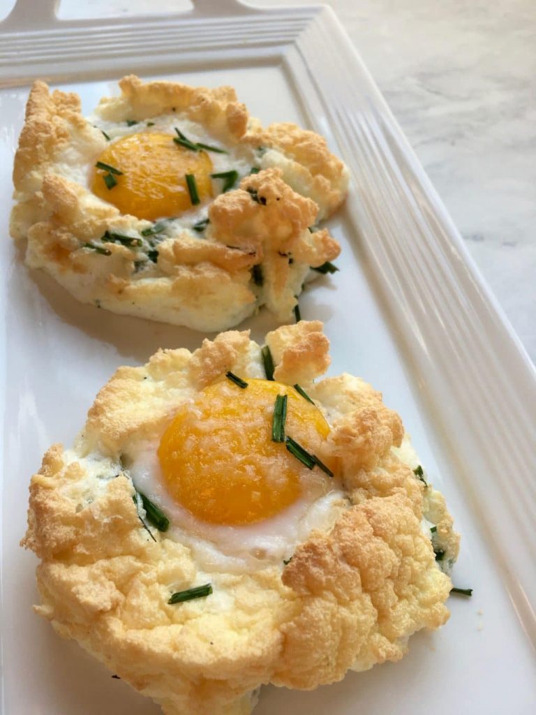 cloud eggs on a white tray on a white counter