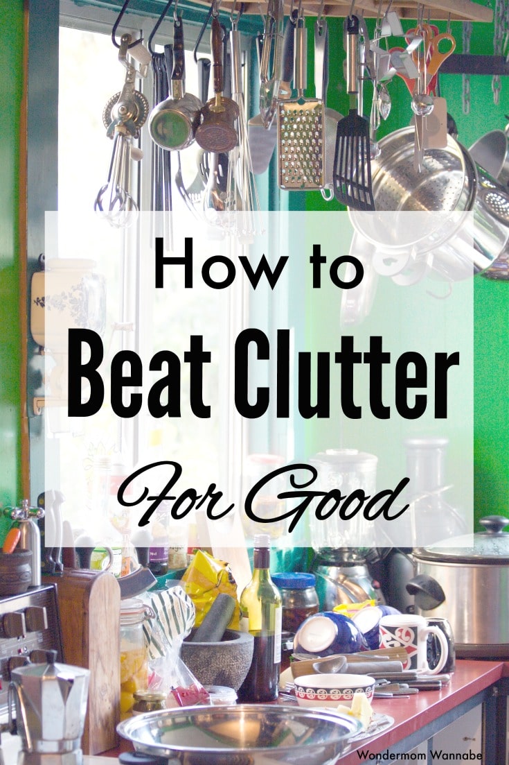 a kitchen with pots and pans hanging and lots of stuff on the counter with title text reading How to Beat Clutter for Good