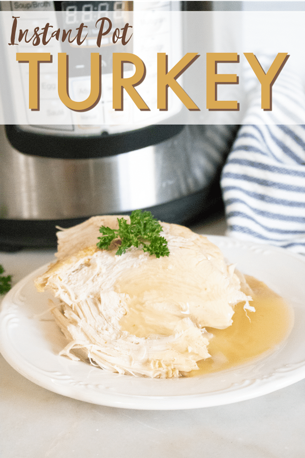 a piece of turkey topped with gravy and parsley on a white plate on a white table with an instant pot and striped linen in the background with title text reading Instant Pot Turkey