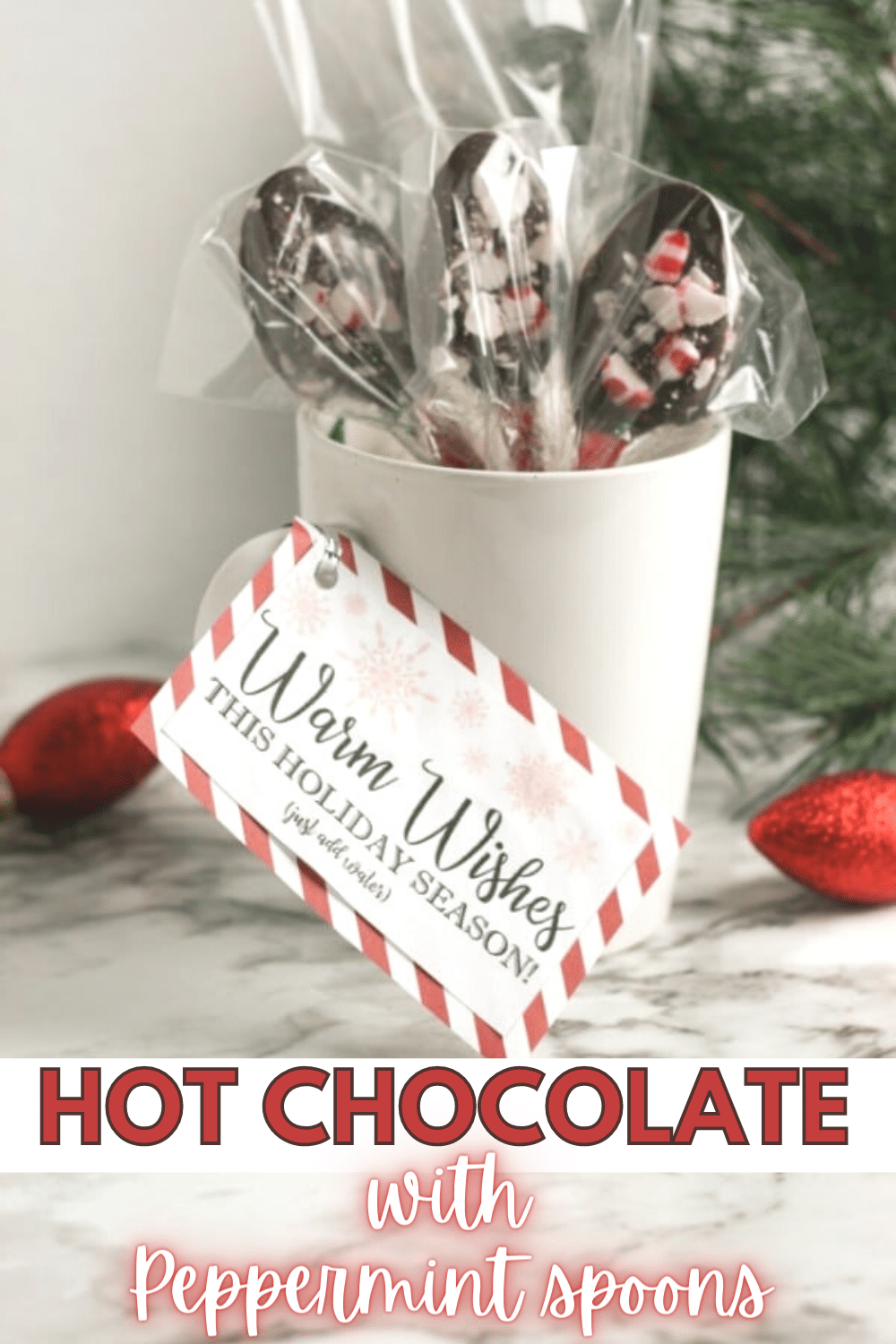 This DIY Hot Chocolate Gift idea is an easy and inexpensive gift that's perfect for almost everyone! Homemade cocoa mix with peppermint stirring spoons packaged in a mug. Free printable gift tag included! #giftideas #Christmas #hotchocolate via @wondermomwannab