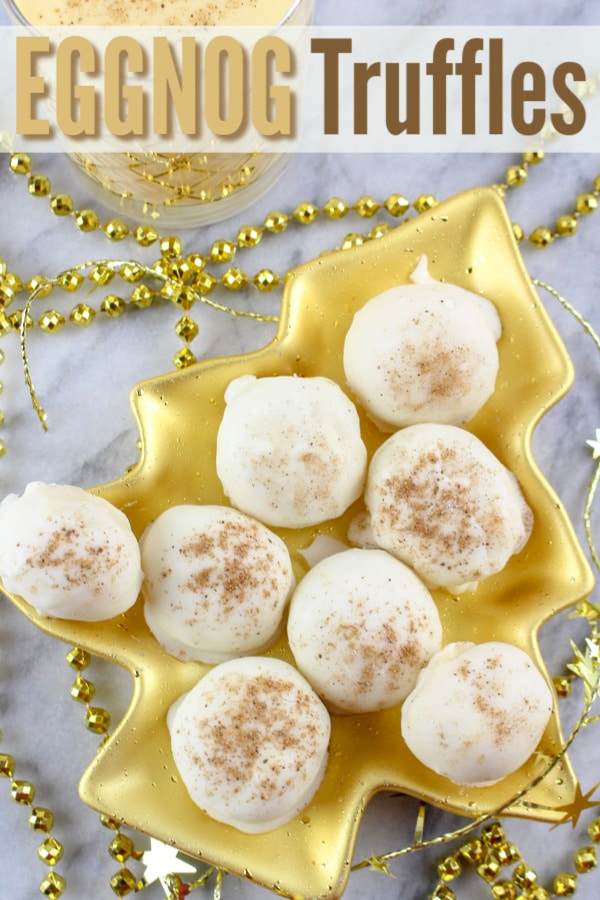 eggnog truffles on a gold Christmas tree plate with gold beads around it on a white counter with title text Eggnog Truffles