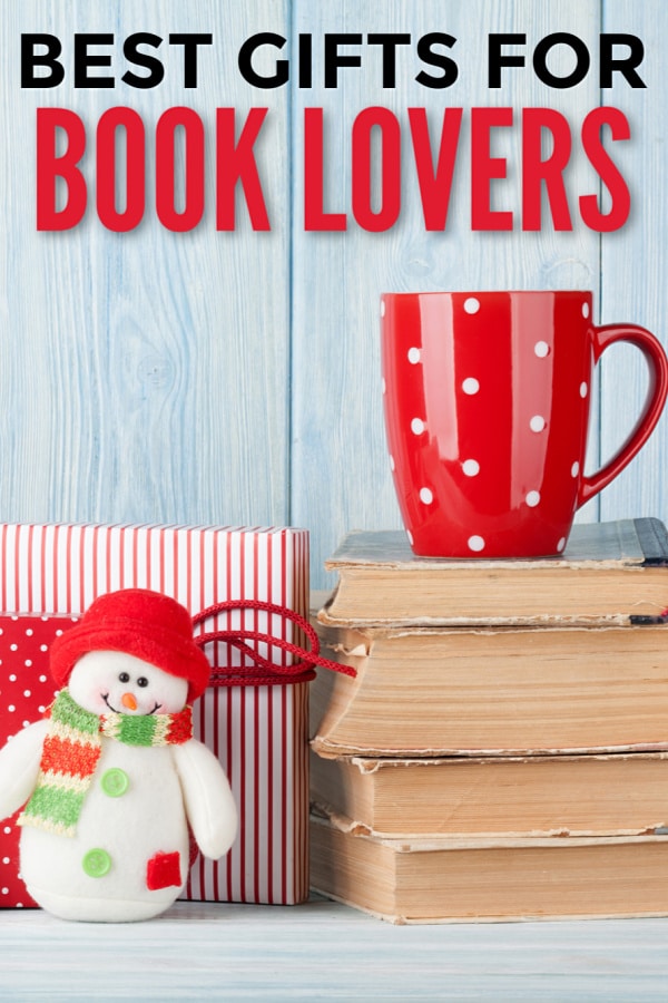 a stuffed snowman, a present, a stack of books topped with a red and white polka dotted mug on a wood background with title text readingBest Gifts for Book Lovers