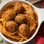 Instant pot spaghetti and meatballs in a white bowl.