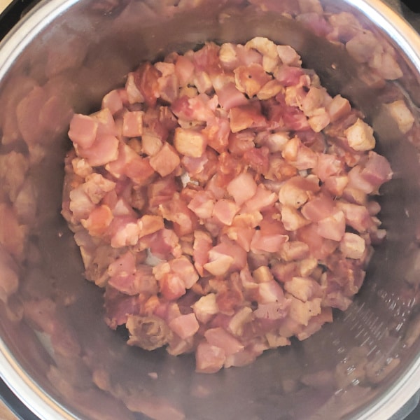 cubed raw pork in an instant pot
