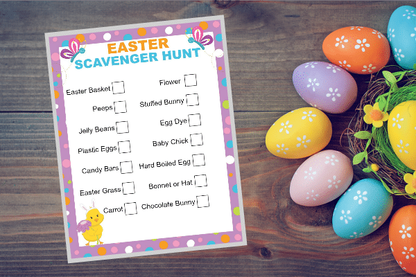 printable Easter Scavenger Hunt next to colored Easter eggs and a basket, all on a wood table