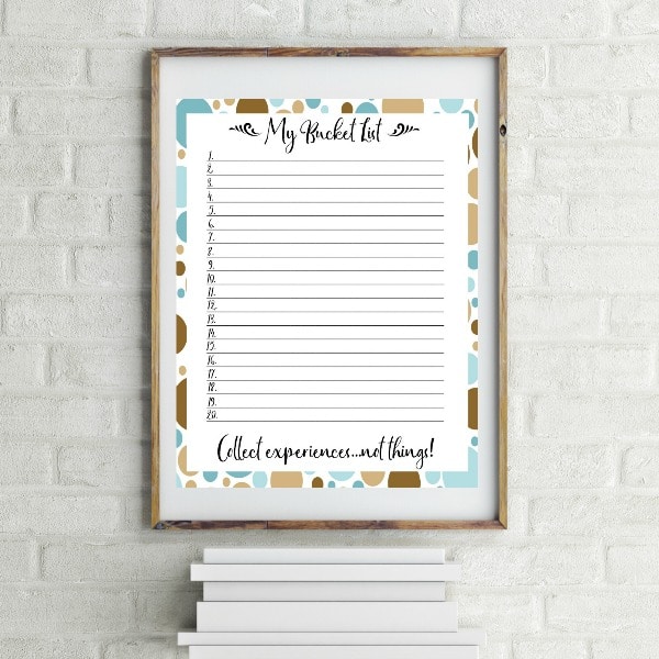 printable Bucket List Template in a frame on a white brick background with some white boxes underneath