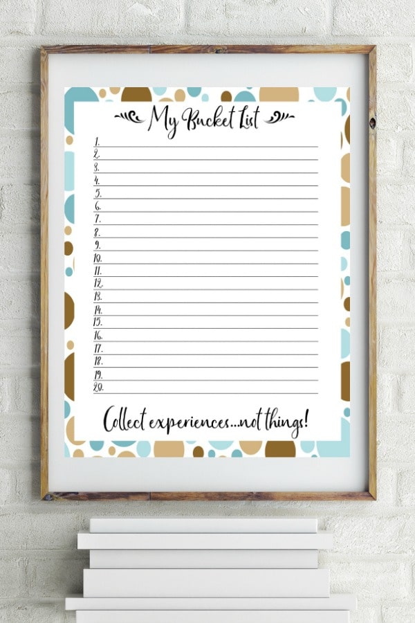 printable Bucket List Template in a frame on a white brick background with some white boxes underneath