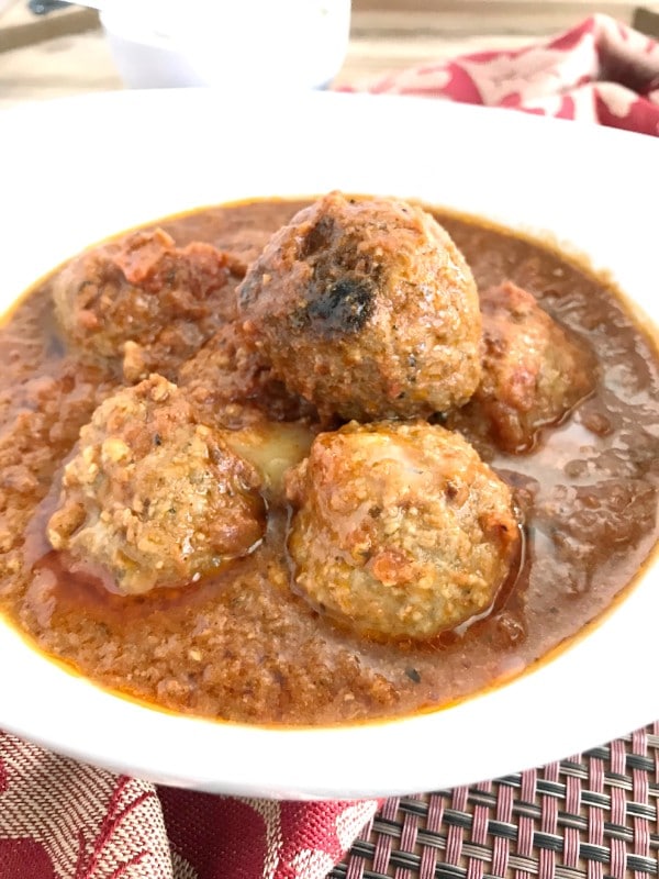 meatballs and sauce in a white bowl