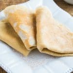 close up of Snickerdoodle Crepes on a square white plate