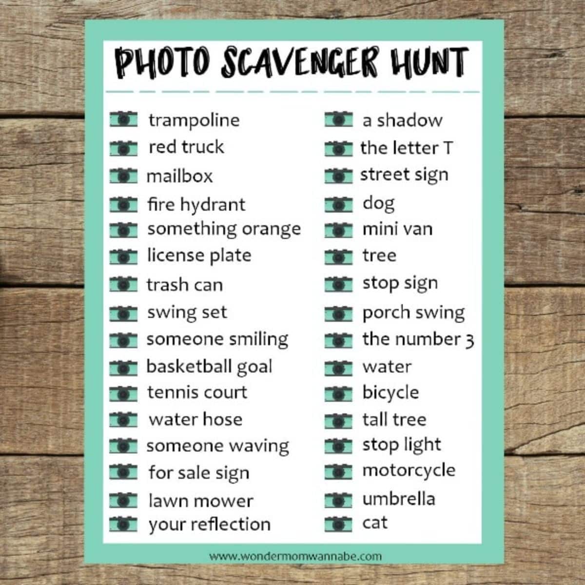 Printable Photo Scavenger Hunt on a wooden table.