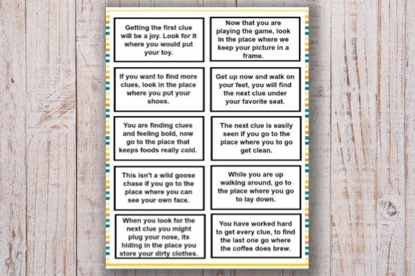 printable Treasure Hunt Clues for Kids on a wood background