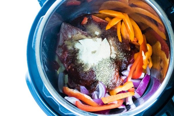 beef, onions, bell pepper and seasonings in an instant pot