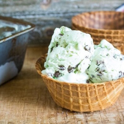 homemade mint chip ice cream recipe in a waffle bowl with extra bowls