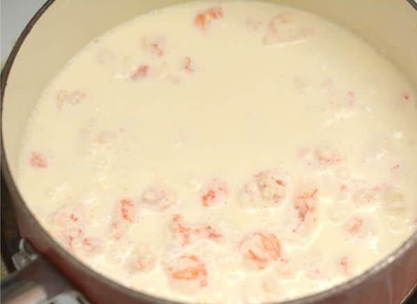 lobster and heavy whipping cream in a saucepan