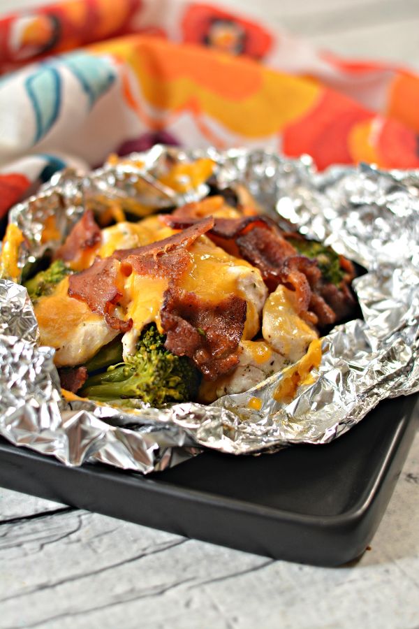 chicken bacon ranch foil packets on a baking sheet