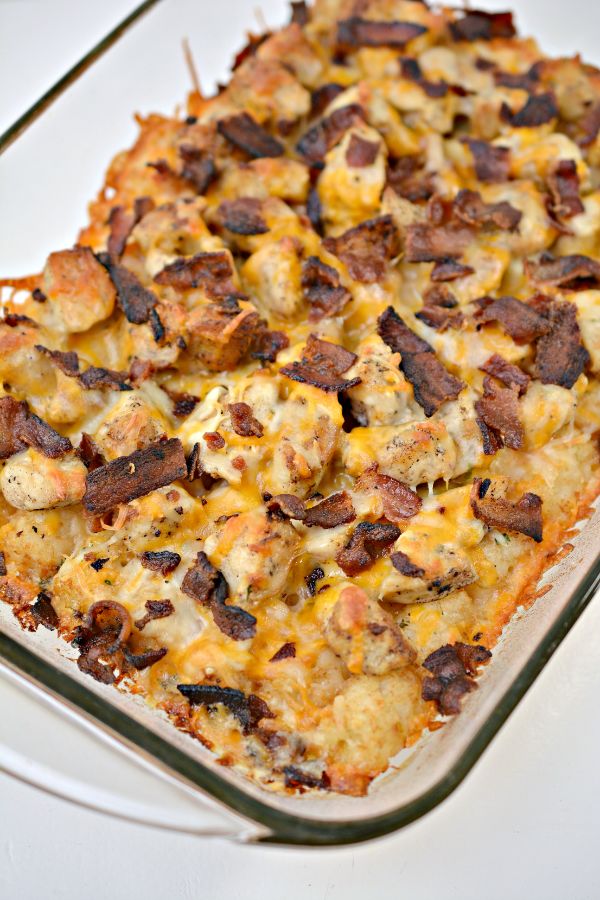 Chicken Bacon Ranch Tater Tot Casserole in a glass baking dish