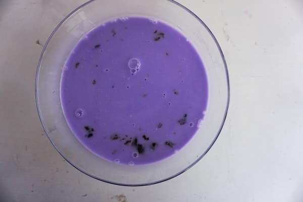 purple milk on a white table to make a dragon frappuccino