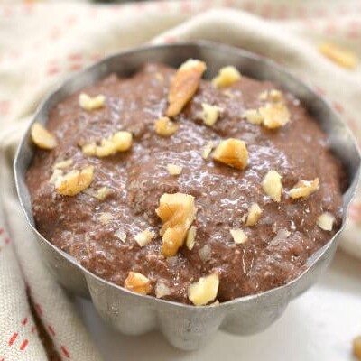 chocolate protein chia pudding in silver bowl