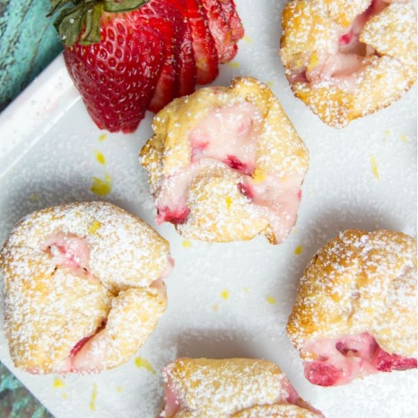 closeup of Strawberry Cheesecake Puffs on a white dish