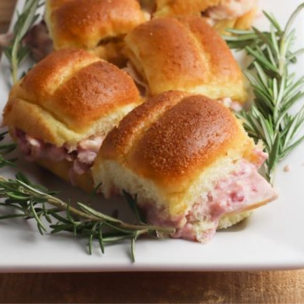 close up of Turkey Cranberry Sliders on a white platter