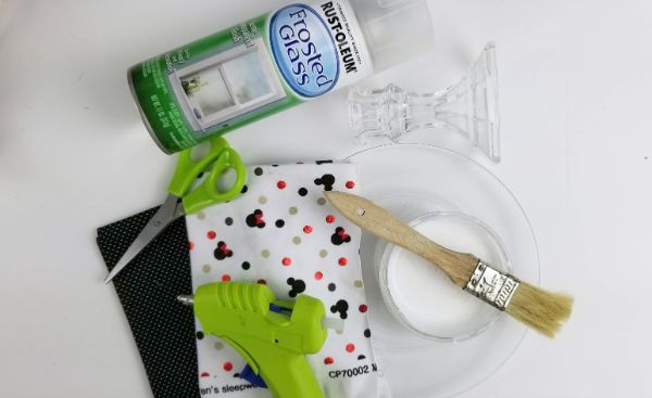 mod podge, paint brush, scissors, frosted glass spray, glue gun, clear cake plate, fabric
