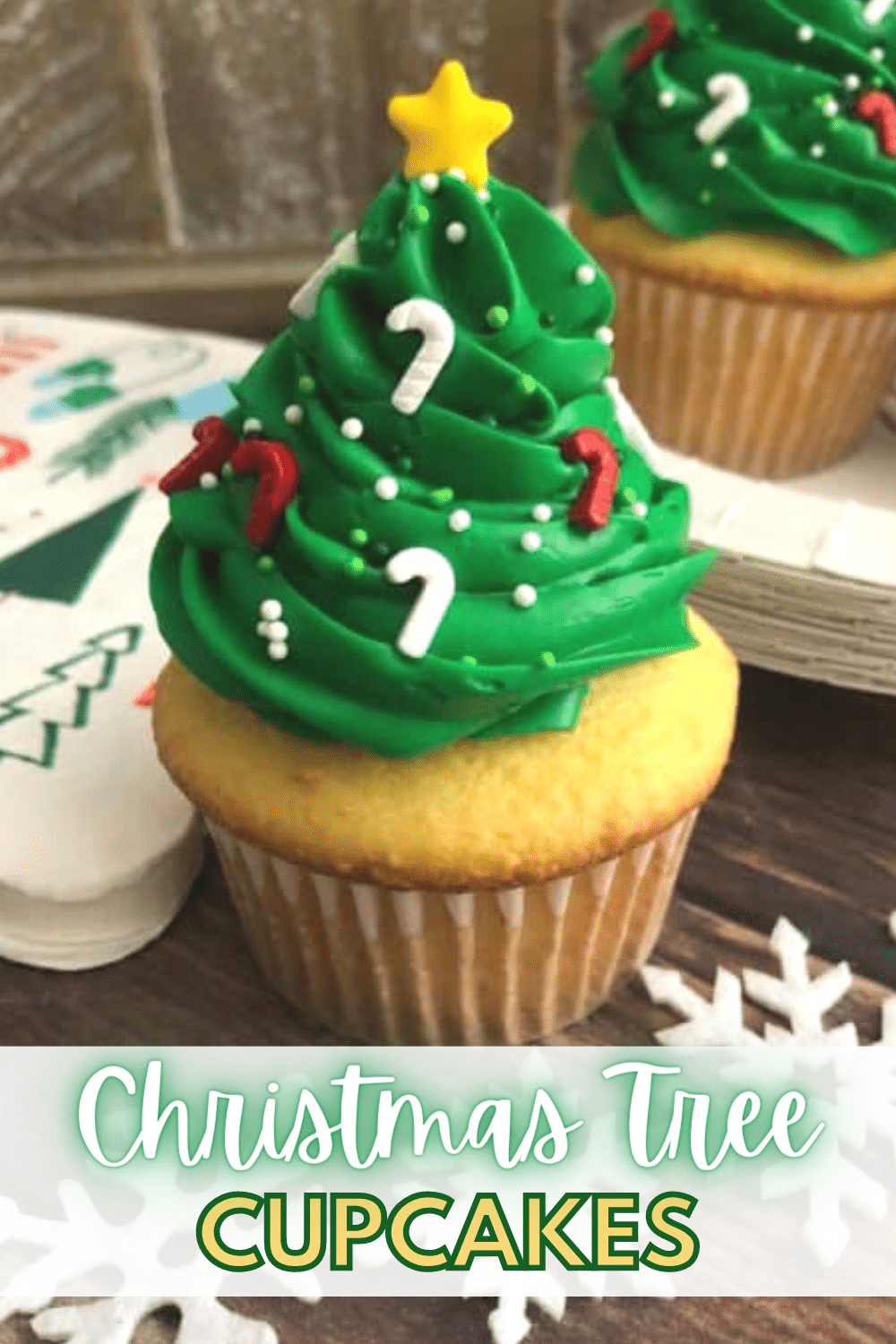 These Easy Christmas Tree Cupcakes are a delicious treat and adorable party decoration all in one! Why not dress up your dessert table with these standout desserts! #christmas #cupcakes #christmastree #recipe via @wondermomwannab