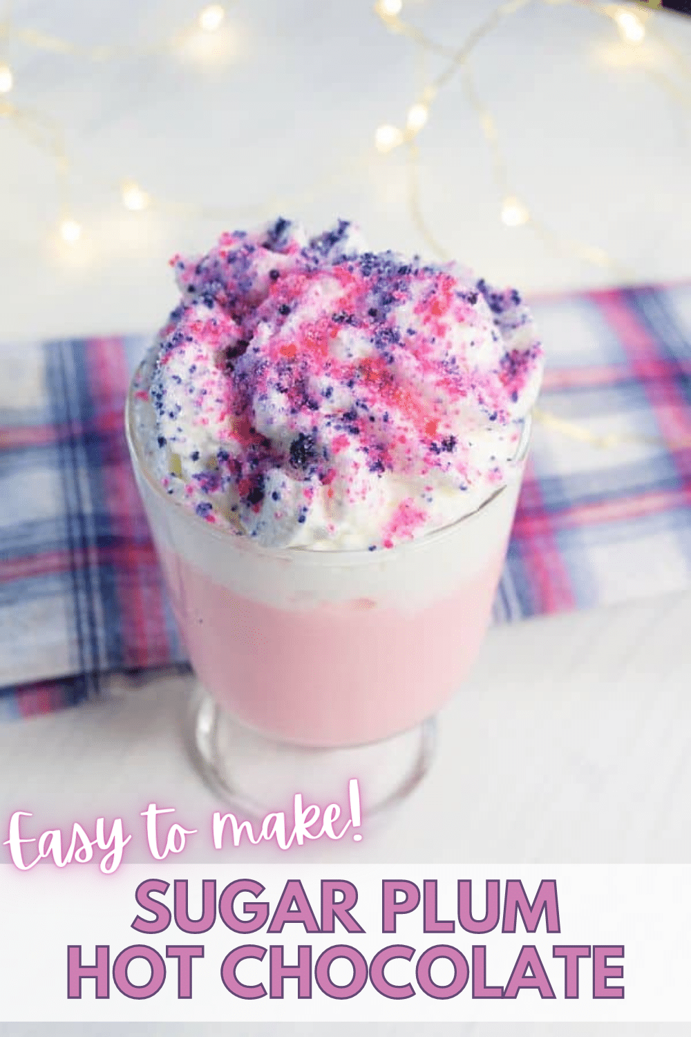 This colorful, flavorful Sugar Plum Hot Chocolate is a wonderful winter treat for both kids and adults. Make up a batch to sip while watching the Nutcracker or simply to warm up after a fun day playing in the snow! #hotchocolate #sugarplumfairy #funfood via @wondermomwannab