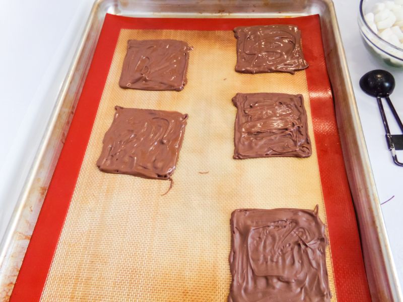 filling in the squares with chocolate 