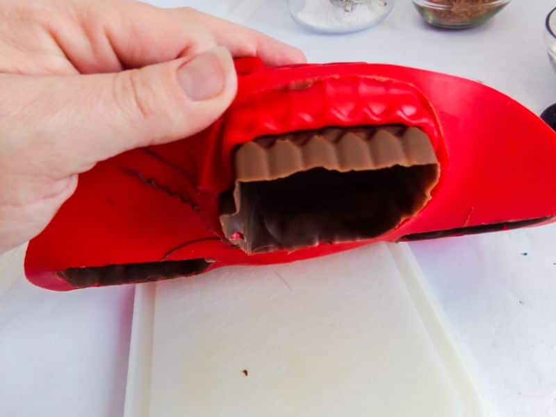 removing the chocolate from the mold 