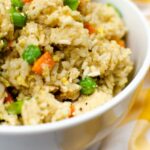 Instant pot chicken fried rice in a white bowl.