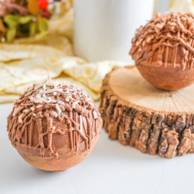 Mounds Hot Cocoa Bombs on wooden platter