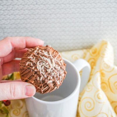 Mounds Hot Cocoa Bombs being put into mug