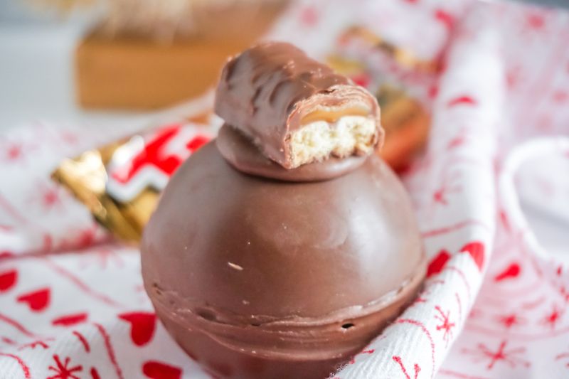 close up of Twix Hot Cocoa Bombs