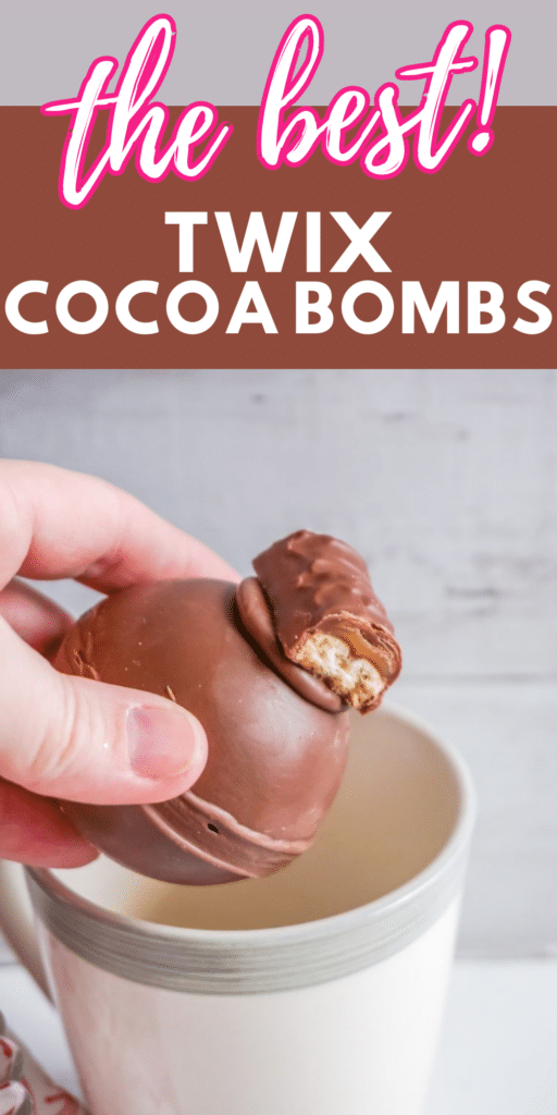 a hand putting a twix hot cocoa bomb in a white mug with title text reading the best Twix Hot Cocoa Bombs