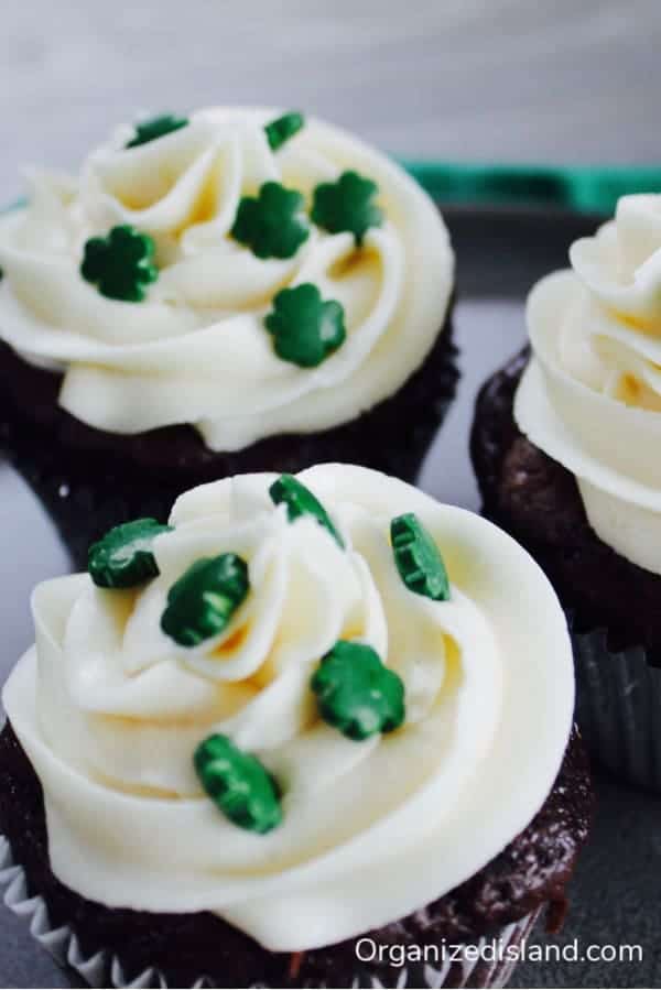 3 Irish Cream Cupcakes topped with shamrock candy