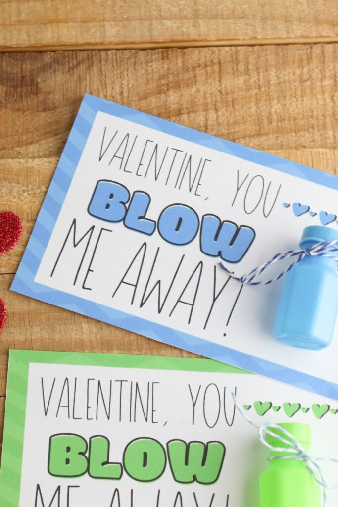 blue and green Bubble Valentines (Free Printable) on a brown wood background