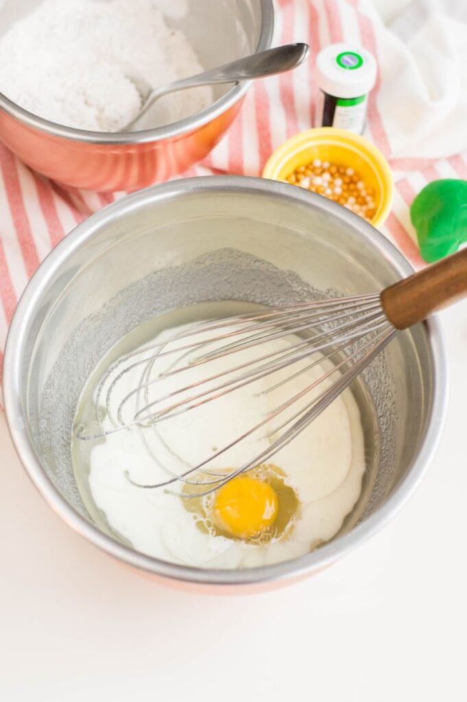 adding in the eggs and whisking 