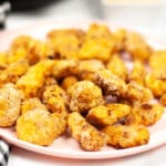 Air Fryer Copycat Chick Fil A Nuggets on round plate