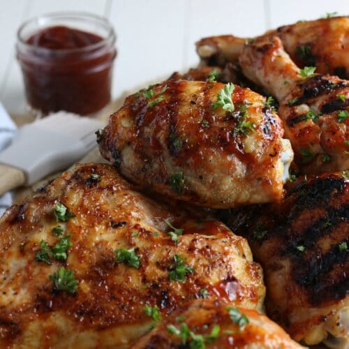 easy grilled chicken on platter with BBQ sauce