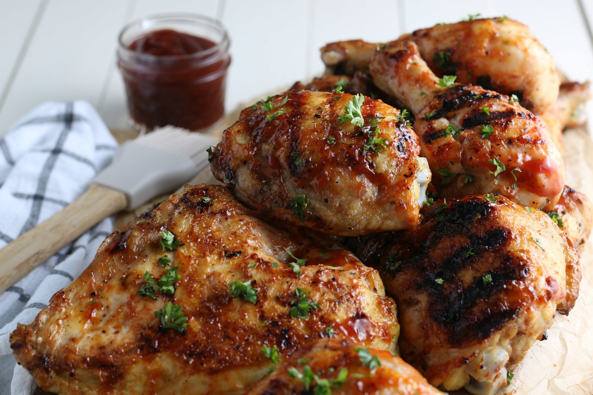 easy grilled chicken on platter with BBQ sauce