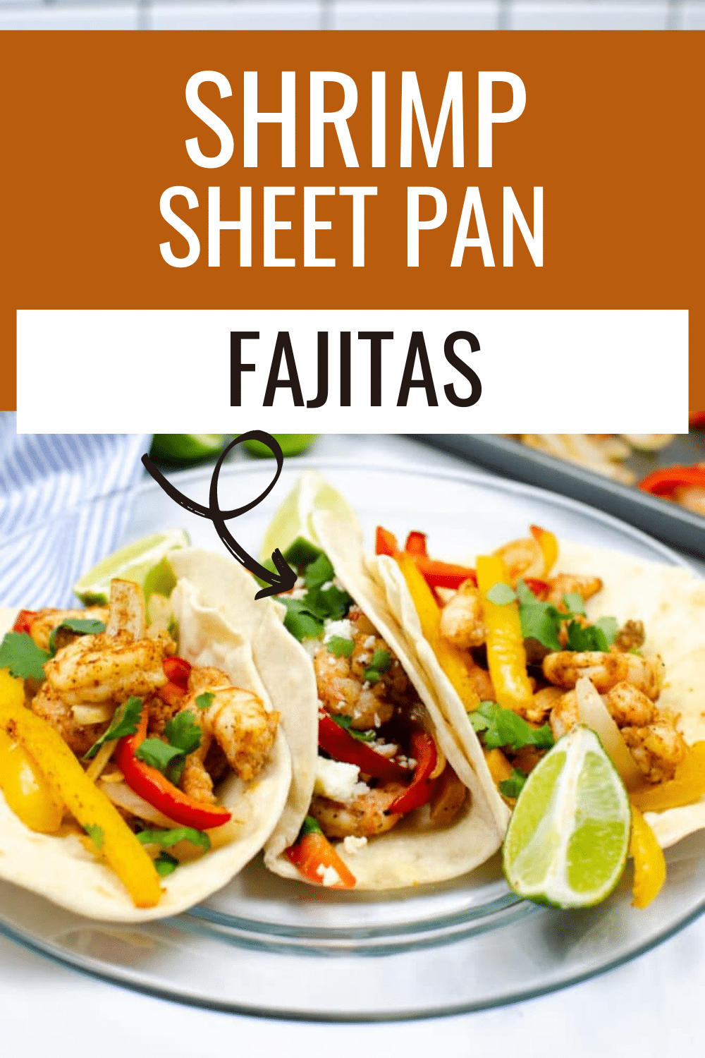 Shrimp Sheet Pan Fajitas Recipe in a glass circle plate with slice of lime on the side with a title text reading Shrimp Sheet Pan Fajitas
