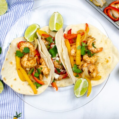 shrimp tacos on white plate