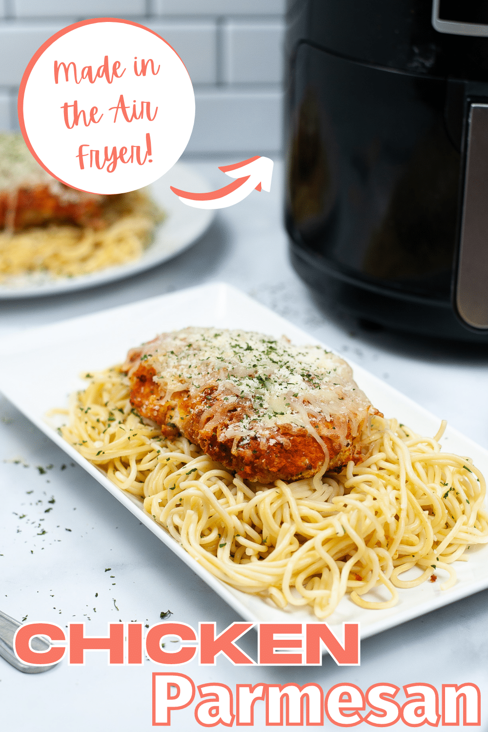 Air Fryer Chicken Parmesan in a plate of pasta