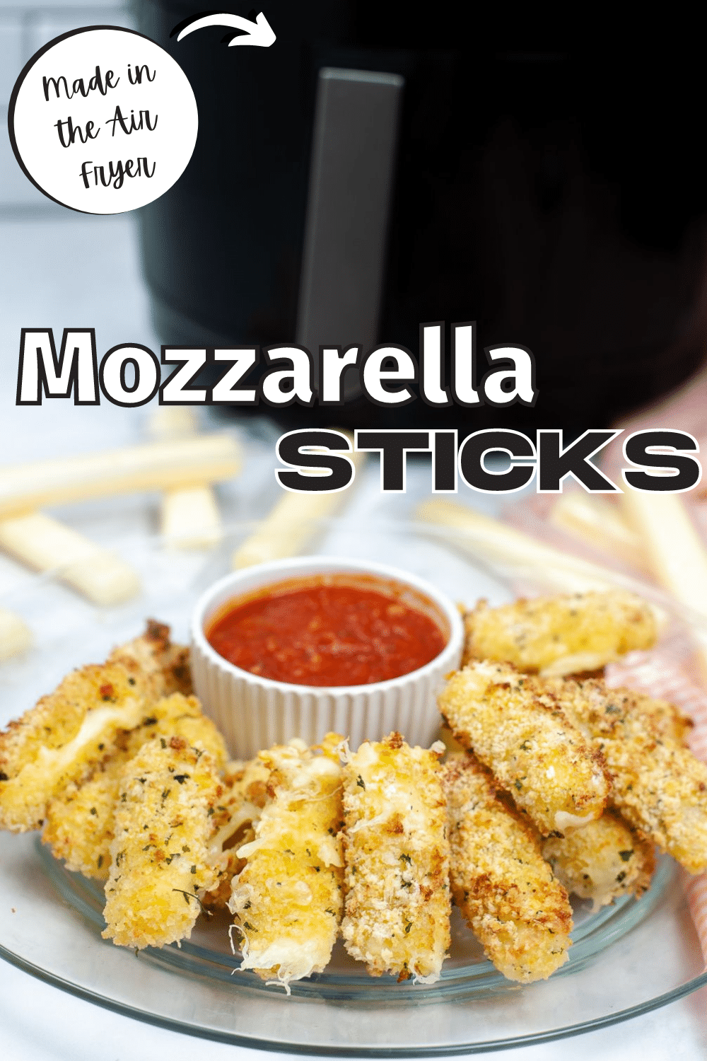 These homemade Air Fryer Mozzarella Sticks are so much better than frozen ones from the store. They're crispy outside & cheesy inside. #mozzarellasticks #homemade #airfryer #appetizers #recipe via @wondermomwannab