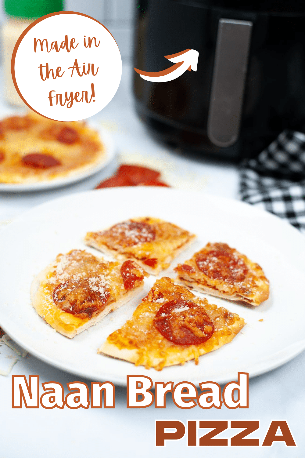 Air Fryer Naan Bread Pizza is a perfectly crisp pizza topped with your favorite pizza toppings. This delicious meal cooks in 30 minutes! #airfryer #naan #naanbread #pizza #recipe via @wondermomwannab