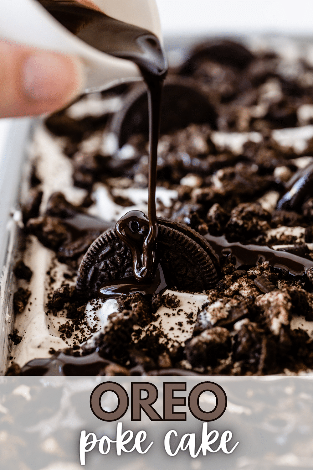 Whenever I want to make a delicious cake for any occasion, I get my trusted recipe book out and go straight to this Oreo poke cake recipe. #pokecake #oreopokecake #cake #dessert #recipe via @wondermomwannab