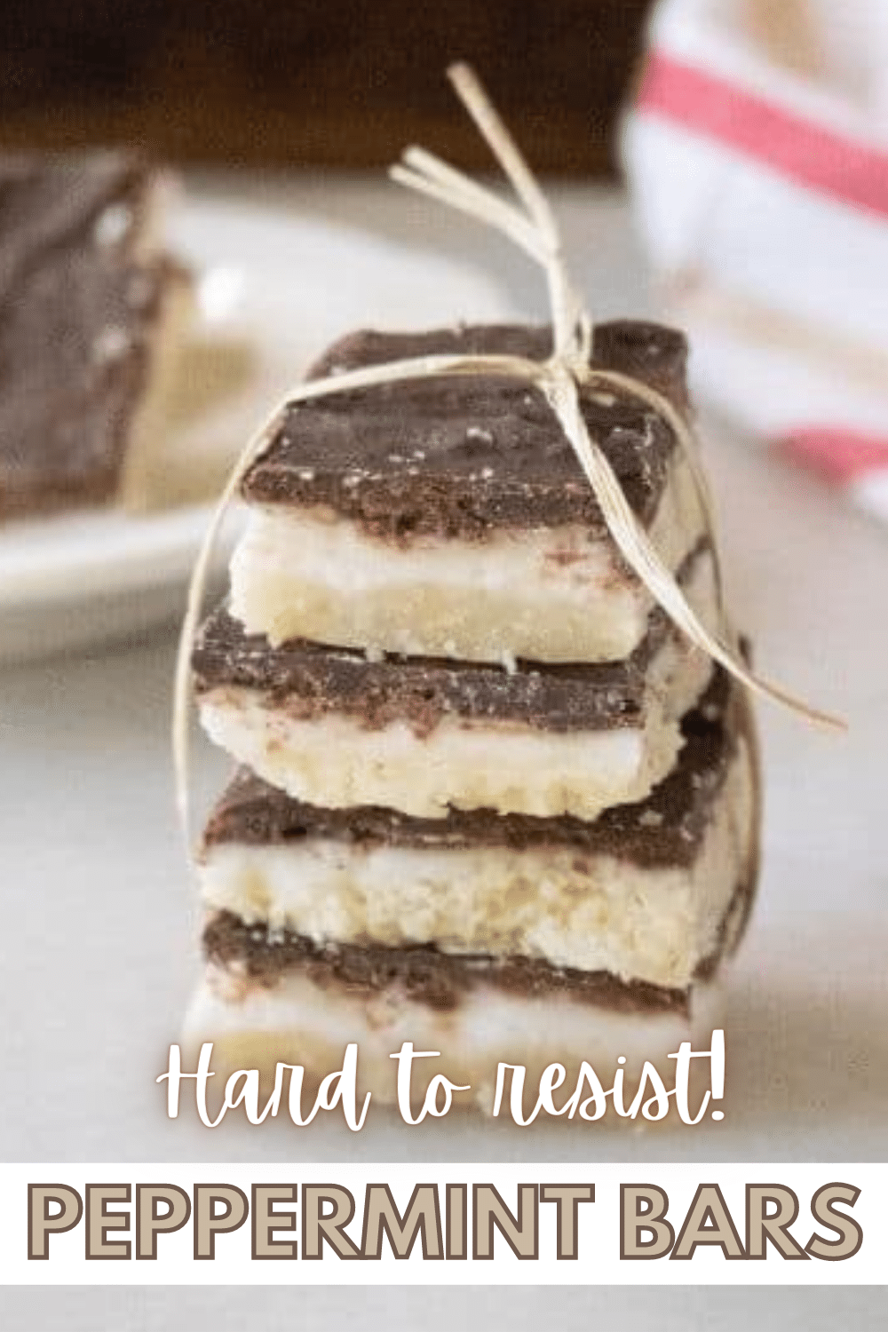 4 slices of Peppermint Bars stacked and tied together.