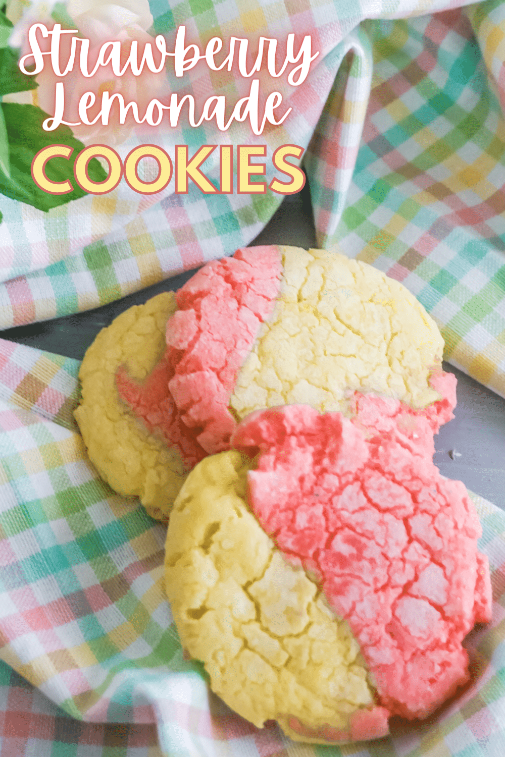 Strawberry Lemonade Crinkle Cookies are the cookies that you need in your life. The two-toned cookies are beautiful to look at! #crinklecookies #cookies #strawberrylemonade #recipe via @wondermomwannab