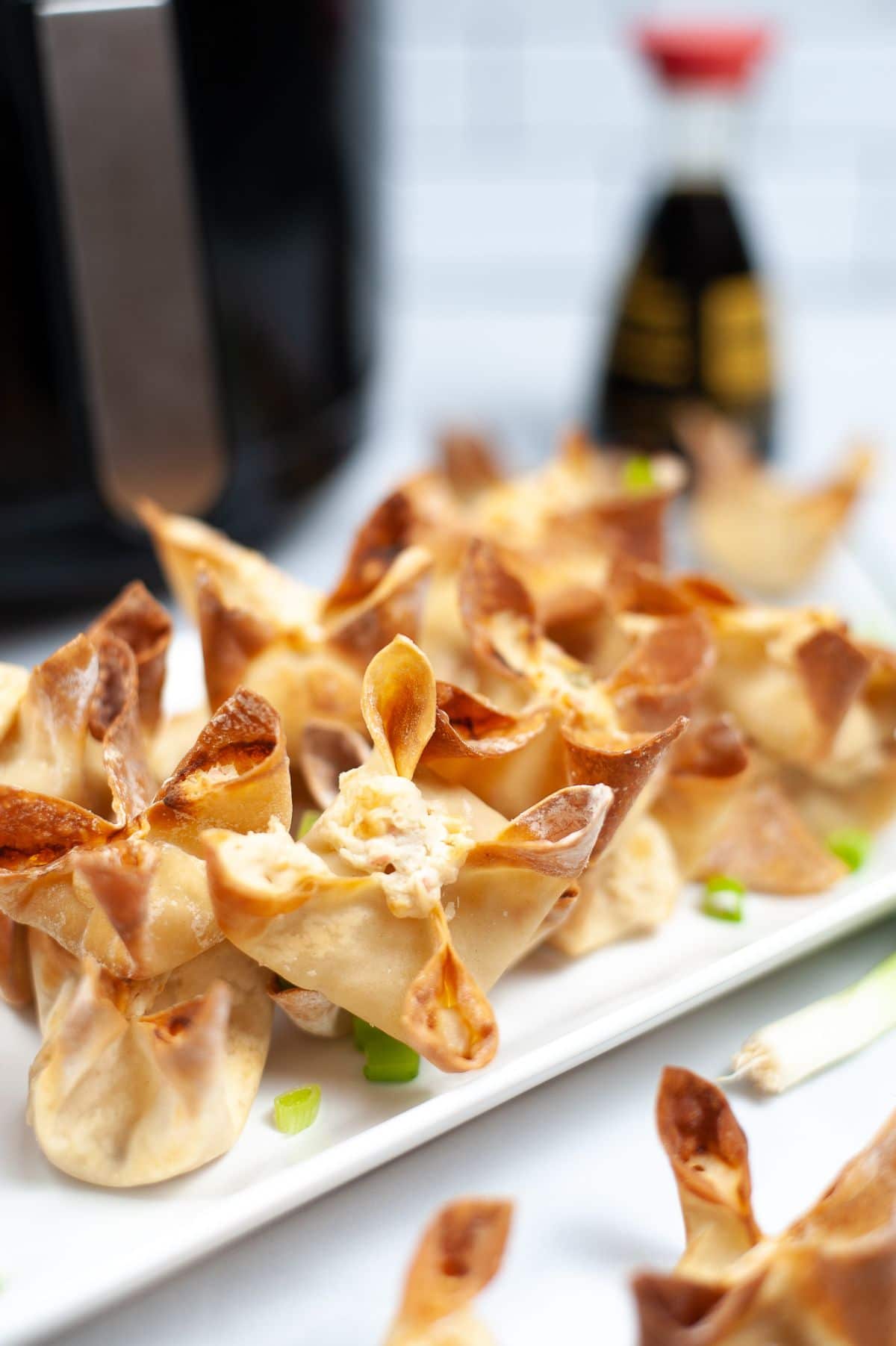 close up of crab rangoon cooked in the air fryer 